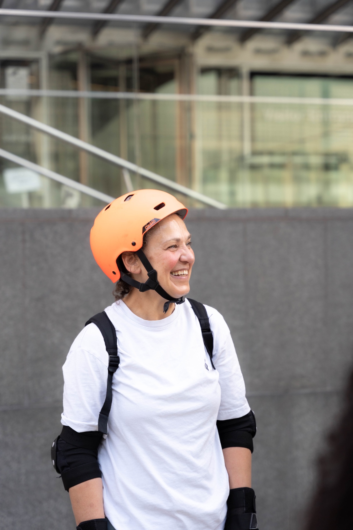 Smiling skater in safety gear